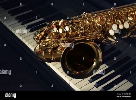 Piano and saxophone, closeup Stock Photo - Alamy