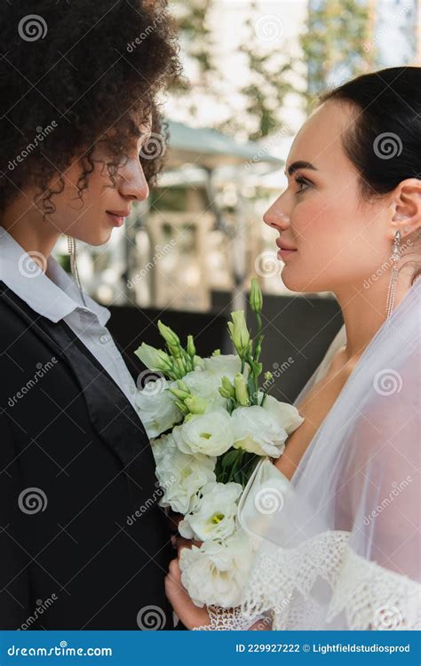 Side View Of Interracial Lesbian Women Stock Photo Image Of Ceremony Profile