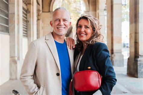 Premium Photo Horizontal Portrait Of A Real Mature Married Couple Smiling And Looking At