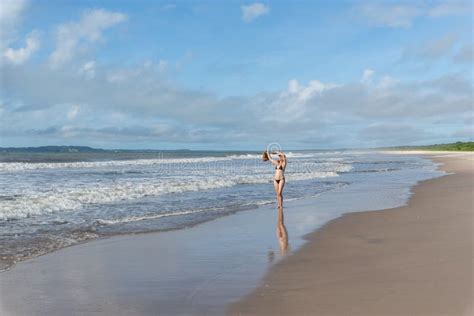 An Adult Woman In A Bikini Walking Under Strong Sunlight On Beach Stock Image Image Of Person
