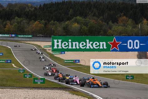 Lando Norris McLaren MCL35 Leads Sergio Perez Racing Point RP20