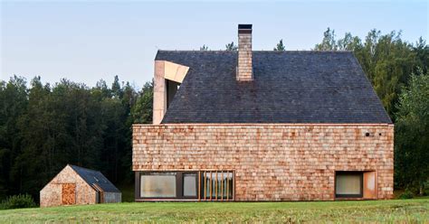 Arches Wraps Cedar House In Façade Of Wood Shingles In Lithuania