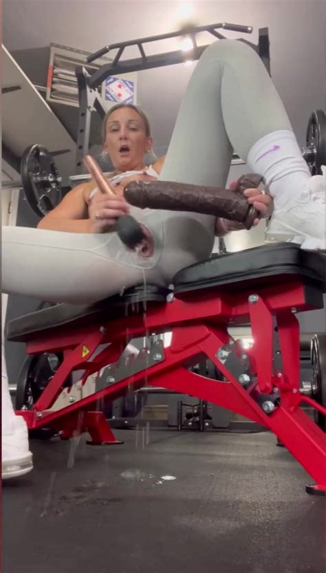 Blonde MILF Plays With Her Pussy Using A Giant Dildo At The Gym