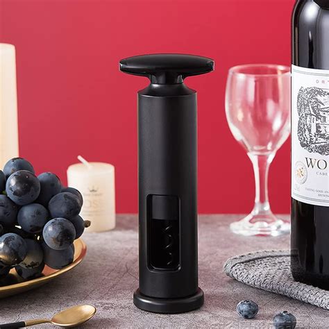 how to use a manual wine opener