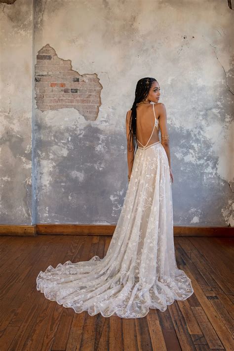 Alluring Boho Lace A-Line Wedding Dress with Low Open Back Detail