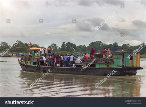 several people are standing on the back of a boat as it travels through ...