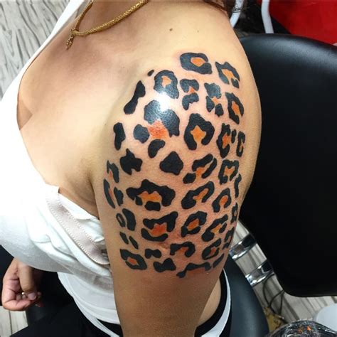 Cheetah Print Tattoos On Thigh