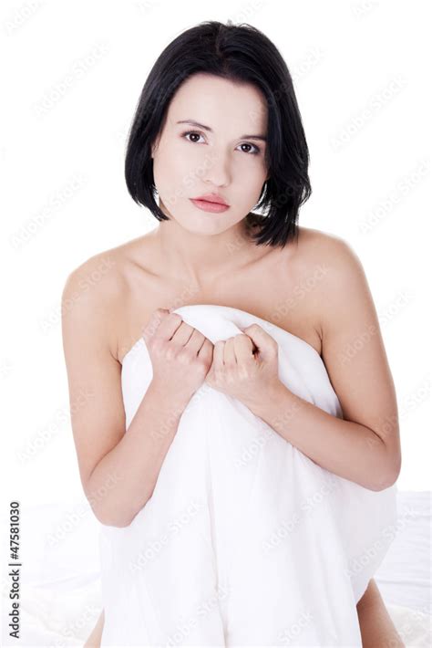 Sexy Nude Woman Covering Her Body With Sheet Stock Photo Adobe Stock