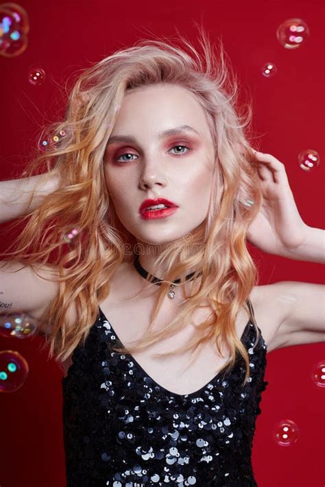 Beautiful Blonde Woman Short Hair Lies In Water On Sea Shore Pond Art Portrait Of A Relaxing