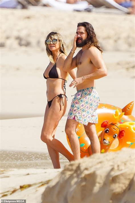 Heidi Klum 50 Sizzles In A Tiny Black Bikini On A Beach In St Barts As She Packs On The PDA