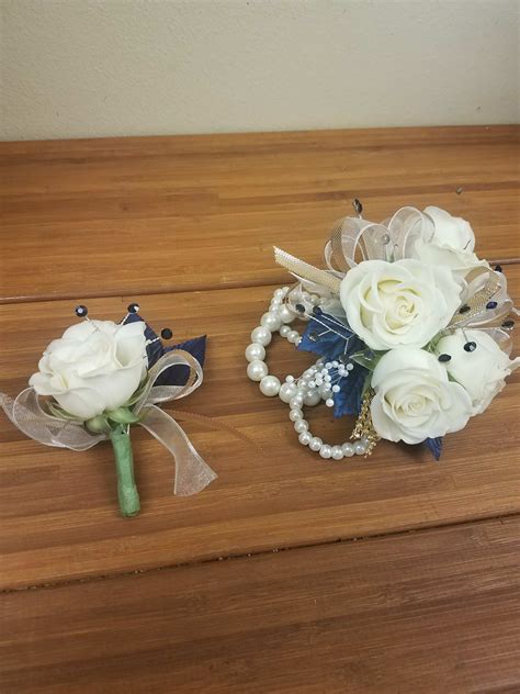 Navy Blue and White Wrist Corsage and Boutonniere Set in Bellevue, NE