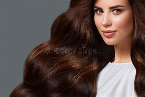 Beautiful Brunette Model Curls Classic Makeup And Full Lips The Beauty Face Stock Image