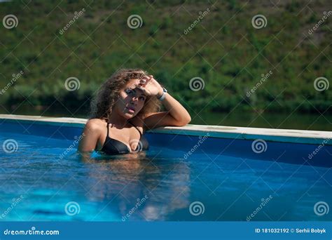Charming Blonde Posing In Pool Stock Photo Image Of Attractive Person