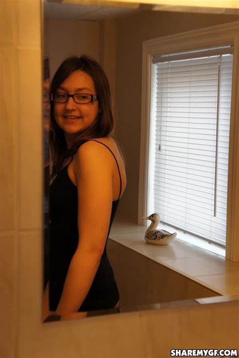 Hot Brunette Teen In Glasses Poses For The Camera Porn Pictures XXX Photos Sex Images