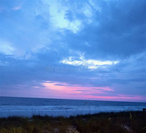 Ocean sunset colors stock image. Image of prairie, evening - 242829813