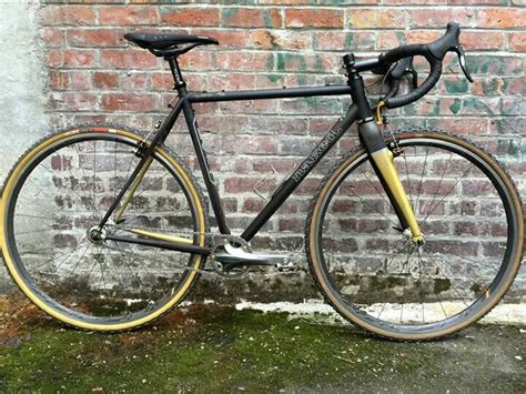 Naked Fixie Bike Leaning Against Brick Wall