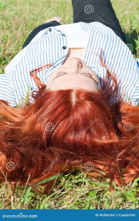 Relaxed Redhead Girl Lying On The Grass Stock Image Image Of Meadow