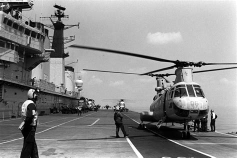 Flight Deck Crewmen Aboard The British Light Aircraft Carrier Hms