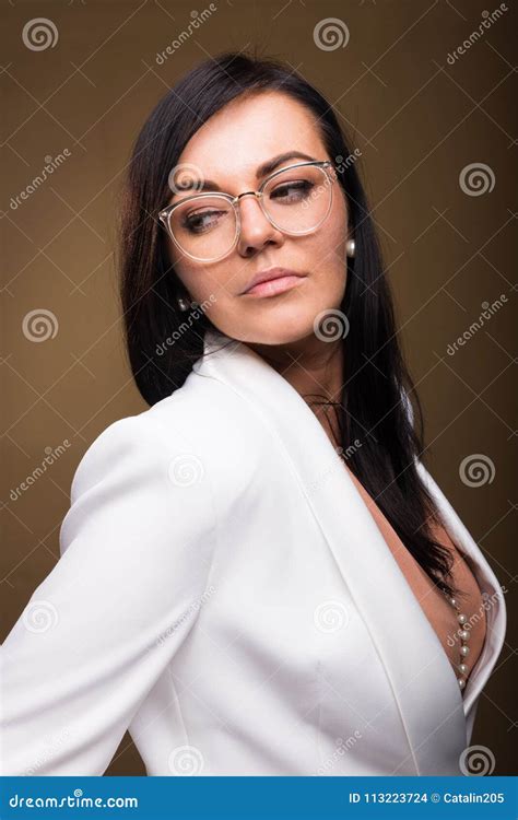 Beautiful Brunette Business Woman Posing Wearing Glasses Stock Photo