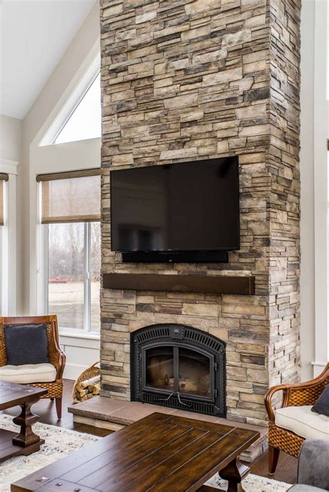 Pin by Devin Chobanik on Acreage | Fireplace tv wall, Exterior stone, Stone veneer