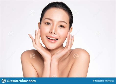 Beauty Face Smiling Asian Woman Touching Healthy Skin Portrait Stock