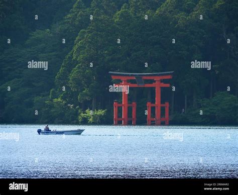 Hakone Shrine torii gate and boat Stock Photo - Alamy