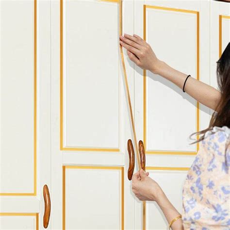 Hot K แผนเทปกาวแปะตดผนงกนนำสตกเกอรตกแตงผนงตดแนนทอง เทปกาวตดพนขนาด50เมตรสตกเกอร