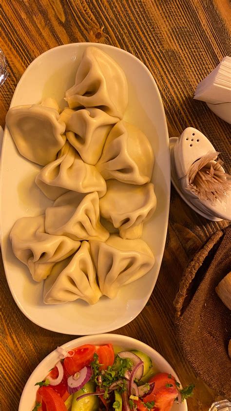 Georgian Traditional food khinkali and mineral water Borjomi. ️🇬🇪 #