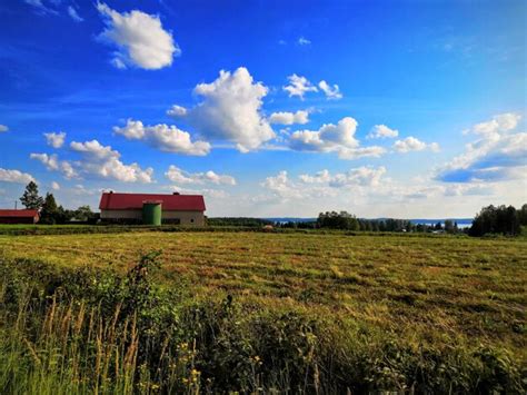 Premium Photo House On Field Against Sky