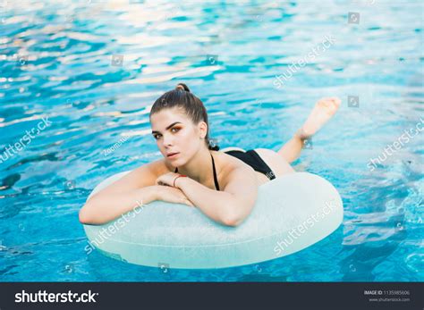 Sexy Brunette By Pool Summer Sexuality Stock Photo