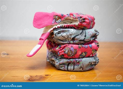 Stack Of Cloth Diapers On A Wooden Table Stock Photo Image Of Cotton