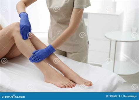 Woman Getting Wax Epilation Of Legs In Salon Stock Image Image Of Perfect Legs 193066619