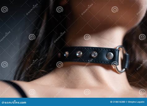 Naked Woman In Black Leather Bdsm Collar With Metallic Ring Nude Female In Seductive Role