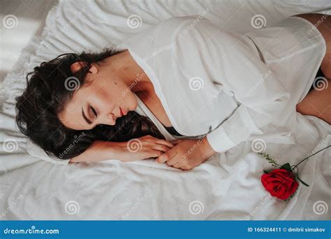 Girl In Lingerie Lying On A Bed With A Rose Stock Image Image Of Glamour Flowers