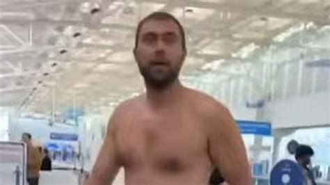 Bizarre Moment Drunk Man 36 Strips Naked And Strolls Through Florida Airport Terminal While