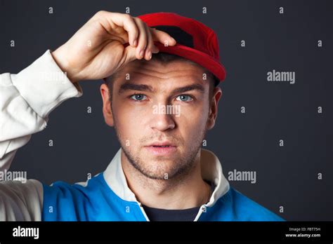 studio portrait  cool  young guy posing  studio stock photo