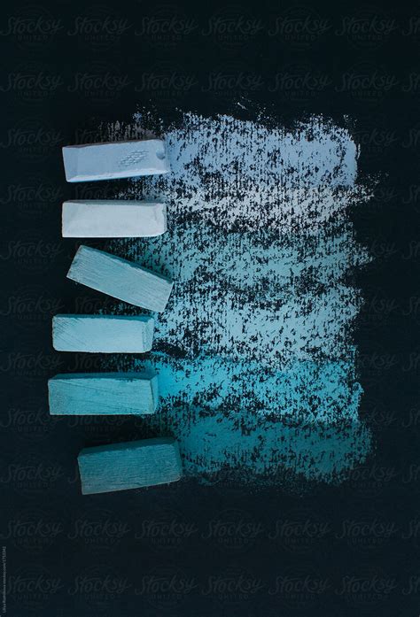 Assorted Blue Soft Pastel Chalks And It S Swatches On Black Paper By