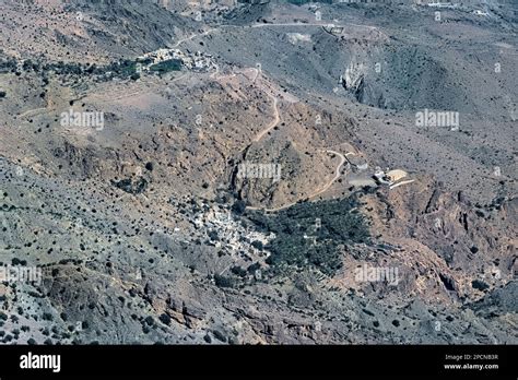 Looking Down To Wakan Village While Trekking In The Western Hajar