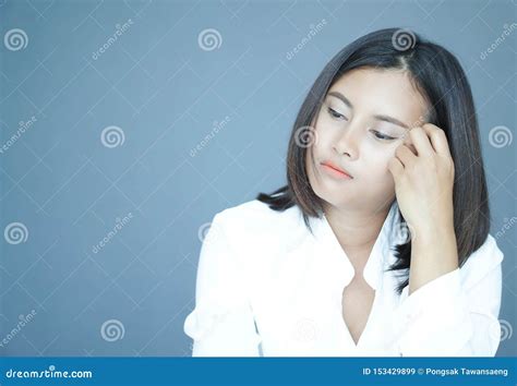 Closeup Woman Sitting On Bed In The Bedroom With Thinking Or Depressed