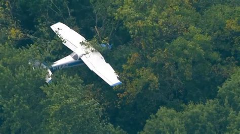 Small Plane Crashes Into Trees Gets Stuck For Hours Near New Jersey