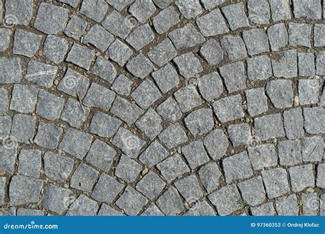 O Godo Apedreja A Rua Que Pavimenta O Fundo Arredondado Imagem De Stock