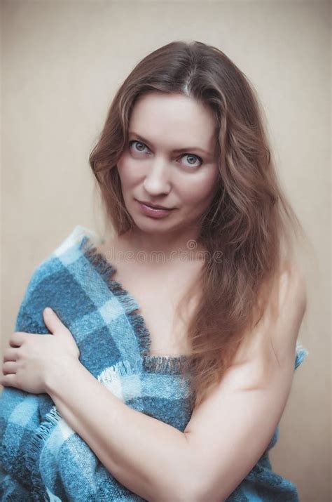 Portrait Of A Beautiful Nude Woman Wrapped In A Checkered Plaid Stock