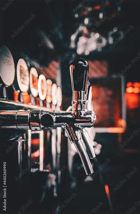 beer taps  bar  pub stock photo adobe stock