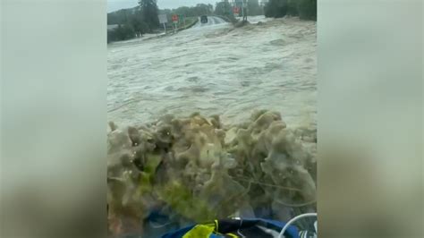 Vehicle powers through cyclone floodwaters