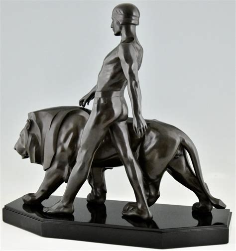 Art Deco Sculpture Of A Male Nude Walking With Lion Belluaire Deconamic