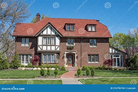 Red Brick English Tudor House With Round Turret Royalty Free Stock