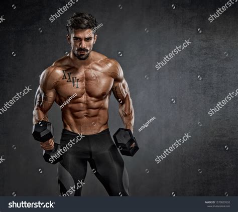 Handsome Muscular Men Lifting Weights Stock Photo 1570029532 Shutterstock