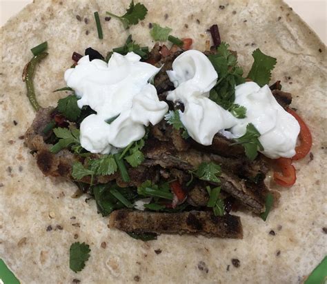 Crunchy crumbed sizzle beef and peppers wrap | bunch