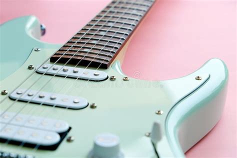 Mint Green Electric Guitar On A Pink Stock Image Image Of Background