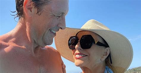 Dame Joan Collins 90 Stuns In White Bikini As She Holidays With Husband Mirror Online